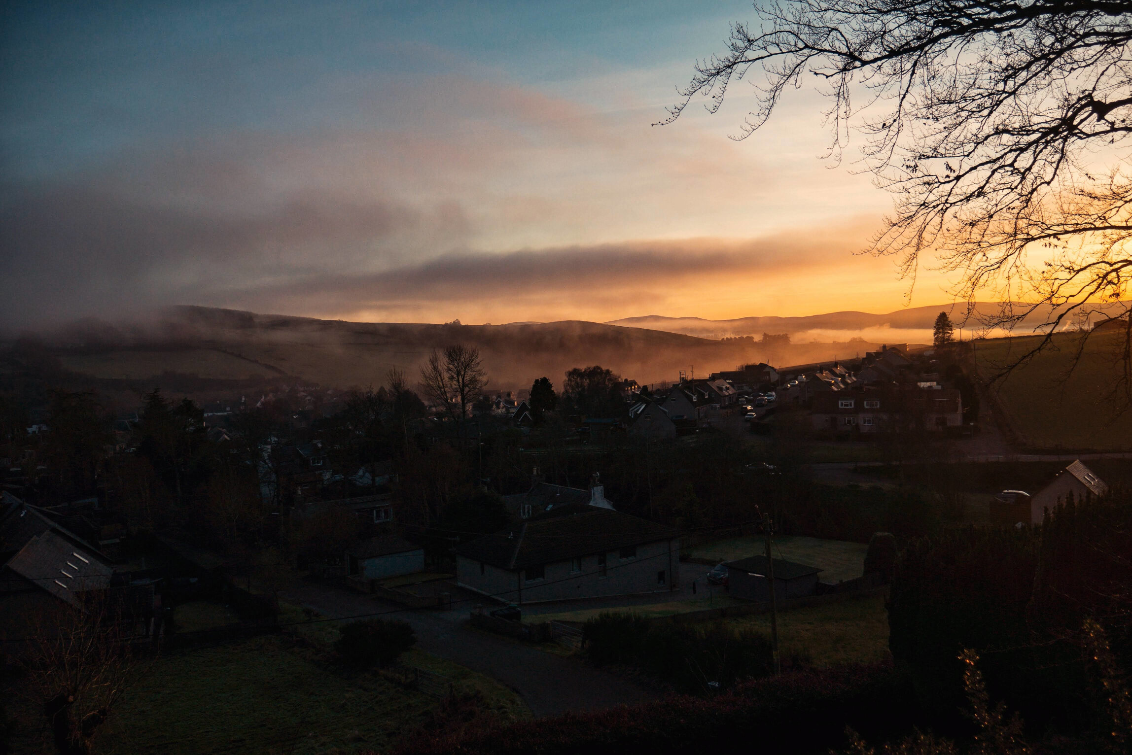 Foggy Village Sunset